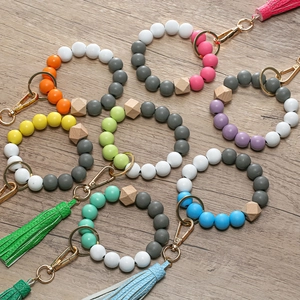 Colorful silicone bead bracelet keychain with leather tassel and wood hexagon bead