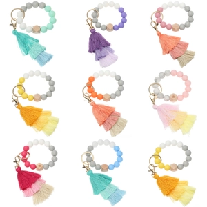 Silicone beaded bracelet keychain with wooden hexagon bead and gradient tassel fringe