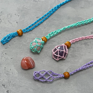 Handmade woven cord necklace with adjustable wood bead and natural stone pouch
