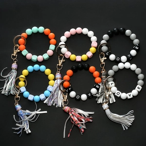 Colorful silicone bead bracelet keychains with LOVE letter beads and leather tassels