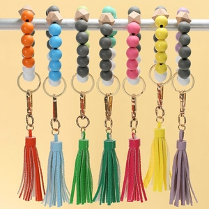 Colorful silicone and wood bead keychain wristlets with PU leather tassels in various sets