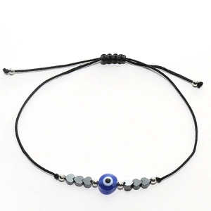 Bracelet tressé ajustable œil protecteur avec perles d'hématite en cœur et cordon