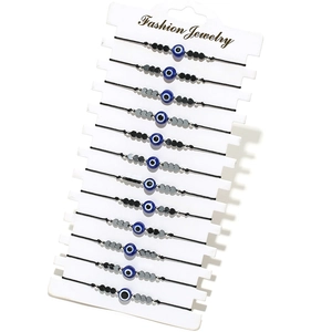 Lot de 12 bracelets tressés avec perles œil bleu maléfique et breloques en cœur