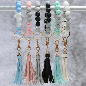 LOVE silicone bead keychain bracelet set with colorful tassels and golden metal rings