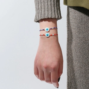 Bracelets Evil Eye faits à la main en fil tressé rouge et bleu avec cordon réglable
