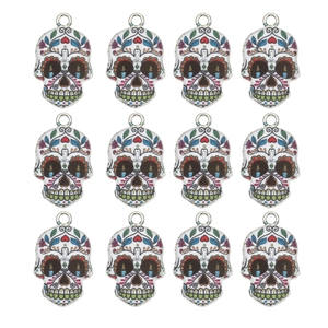 Detailed grid view of twelve colorful Mexican sugar skull alloy pendants for jewelry making