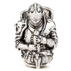 Macro shot of a Viking medieval knight helmet bead in antique silver finish