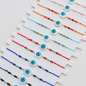 Bracelets tressés Mauvais Œil colorés avec nœud ajustable et perles de rocaille