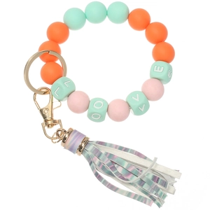 Detail of colorful silicone beads keychain with LOVE letters and holographic tassel