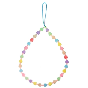 Detailed view of colorful heart-shaped acrylic beads and white pearls on phone charm strap