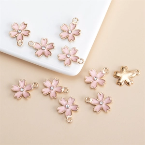 Pendentifs fleurs de cerisier en émail rose dorés avec strass pour création de bijoux DIY