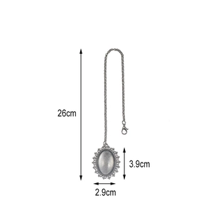 Vintage silver alloy oval locket frame with intricate floral edges on a sleek metal chain