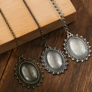 Vintage alloy oval locket pendants with resin stone in bronze, black and silver finishes
