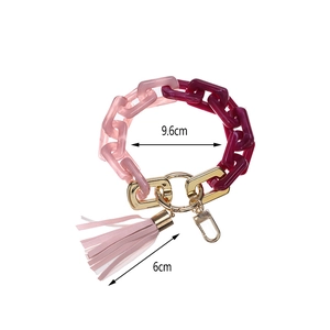 Acrylic chain keychain bracelet with gradient pink links and pink leather tassel