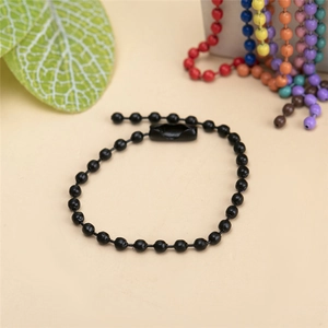 Close-up of black metal ball chain with connector shown among various colorful chain options
