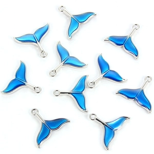 Macro shot of 10 gradient blue mermaid tail charms with silver-tone alloy frames