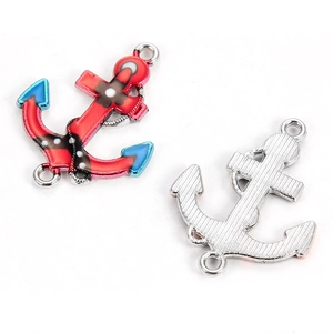 Detailed macro view of colorful enamel anchor charms with silver striped metal texture back