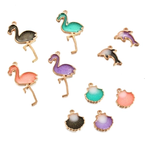 DIY gold alloy charms set with glitter enamel flamingos, dolphins and shells for jewelry