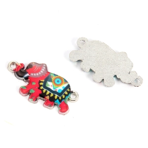 Detailed close-up of bohemian enamel elephant charm with silver mesh back and dual hooks