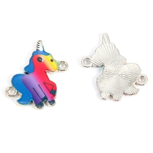 Detail of colorful enamel unicorn charm with silver back for DIY jewelry crafts