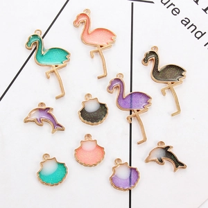 Detailed view of alloy enamel animal charms featuring flamingos and marine life for DIY jewelry