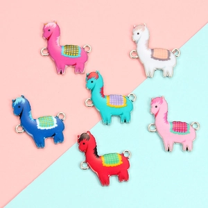 Macro view of colorful alpaca enamel alloy pendants with double metal hanging loops