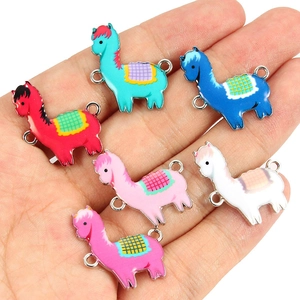 Macro view of colorful enamel llama charms for DIY bracelet and jewelry making
