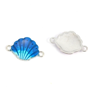 Detailed macro view of blue gradient shell pendant charms for DIY jewelry making crafts