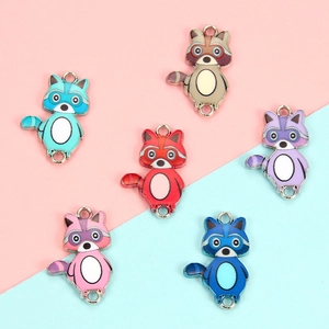 Detailed view of colorful enamel raccoon charms with dual connector rings for DIY jewelry