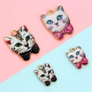 Detail of K-gold cat charms with colorful oil drop finish for DIY jewelry