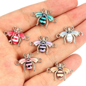 Colorful enamel bee jewelry connectors in six vibrant shades for DIY bracelets and necklaces