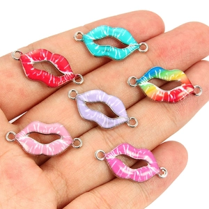 Detailed view of colorful lip-shaped alloy connectors for DIY bracelet and jewelry making