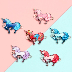 Detail of colorful enamel unicorn charms with double connector rings for DIY jewelry