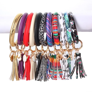 Modische PU-Leder O-Ring Armband-Schlüsselanhänger mit bunten Quasten und diversen Mustern