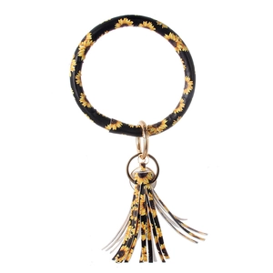 Detail eines PU-Leder-Schlüsselanhängers mit Sonnenblumenmuster, Goldring und Quaste