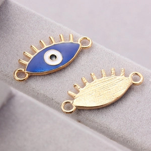 Connecteur mauvais œil bleu roi avec cils et doubles boucles pour la création de bijoux