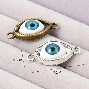 Retro evil eye jewelry connectors in antique silver and bronze for DIY crafting