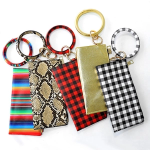 Fashionable PU leather tassel keychain bracelet bags in colorful diverse patterns