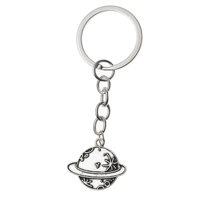 Vintage silver planet keychain with celestial mountain engraving and sturdy metal ring