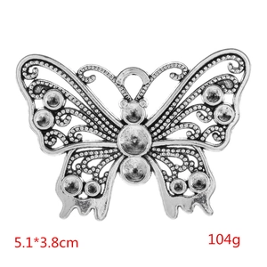 Λεπτομερής όψη μενταγιόν πεταλούδα 5,1x3,8cm με περίτεχνα φιλιγκράν σχέδια