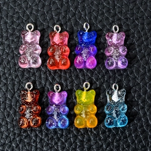 Set of eight colorful glitter resin gummy bear pendants with silver hooks for DIY jewelry