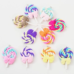 Lot de 10 pendentifs sucettes colorés en résine avec nœuds pour bijoux DIY
