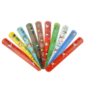 Selection of festive slap bracelets featuring Santa, reindeer, and snowmen patterns