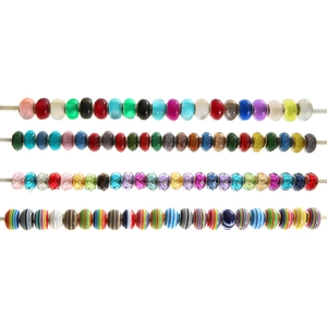 Assorted DIY large hole crystal beads for bracelets including striped and faceted styles