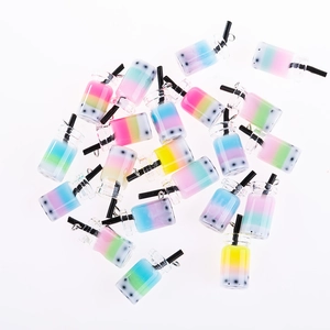 Macro detail of miniature resin bubble tea charms for DIY handmade jewelry and earrings