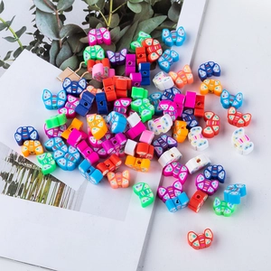 Perles papillon colorées en pâte polymère pour la fabrication de bijoux faits à la main