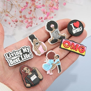 6-piece set of Black Girl Magic PVC shoe charms with inspirational phrases and vibrant illustrations