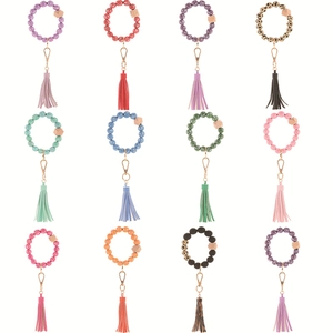 Patterned wooden bead bracelet keychains with tassels in 12 assorted vibrant colors