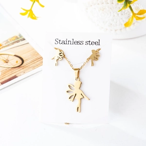 Close-up of golden fairy jewelry set made of stainless steel with delicate cutout detail