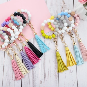 Llavero pulsera de cuentas de silicona Morandi con borla de cuero y madera